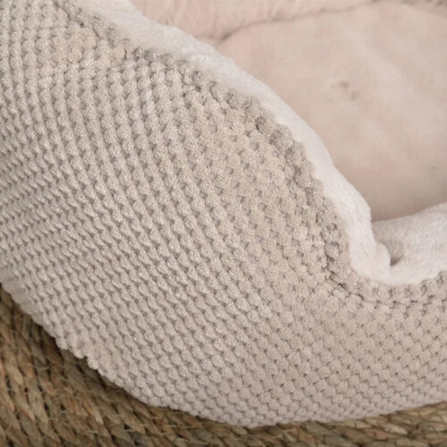 Soft plush fabric close‑up, comfortable warm material of round pet bed for cats dogs